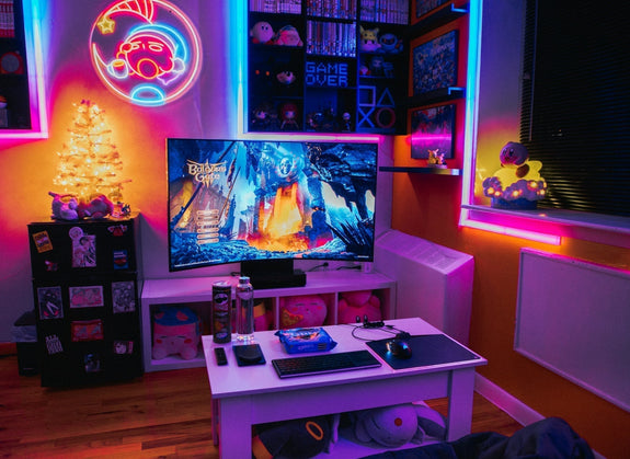 A modern living room setup with a television and game system, illustrating a stylish and functional modern gaming room design.