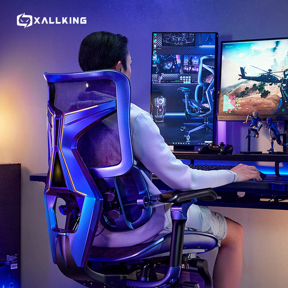 Person using an Ergonomic gaming chair in Australia in front of computer monitors with XALLKING branding.